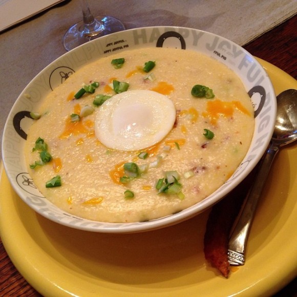 Grits_with_cheese,_bacon,_green_onion_and_poached_egg_e